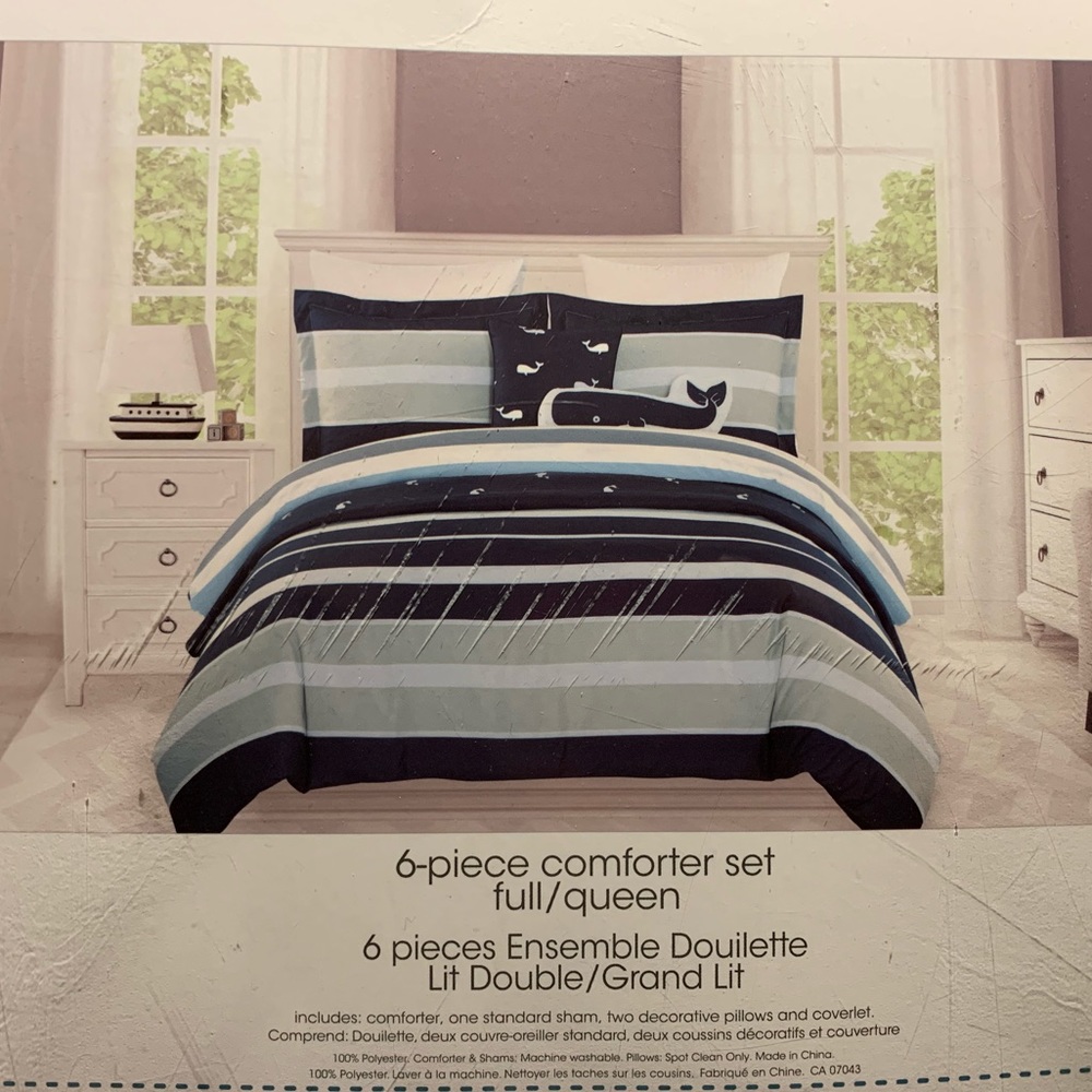 Striped comforter set with decorative pillows